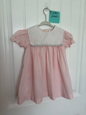 Pink Baby Dress with White Bib and Embroidered Trim